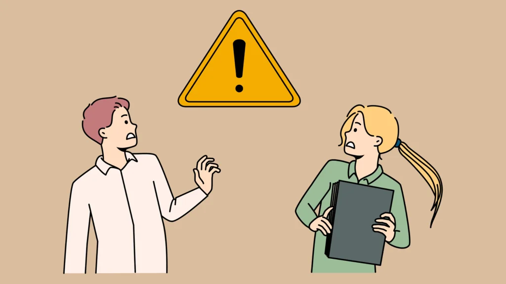 注意マークに驚く男女のイラスト